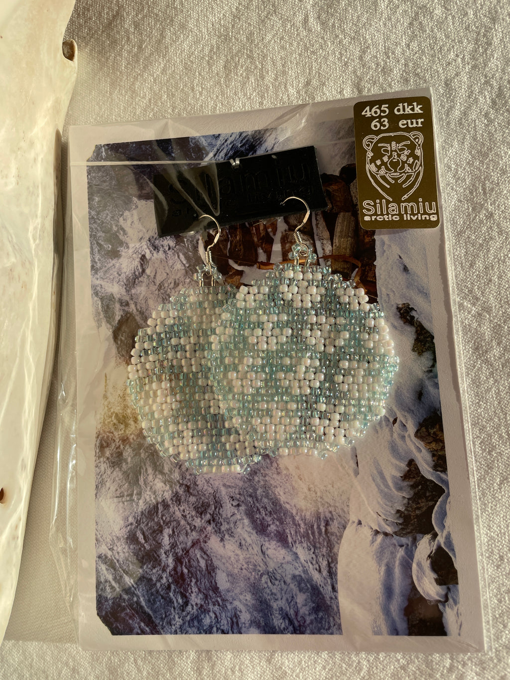Ulo, the female planet - iceblue and white