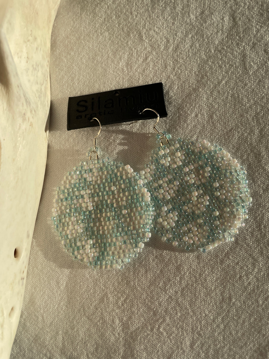 Ulo, the female planet - iceblue and white