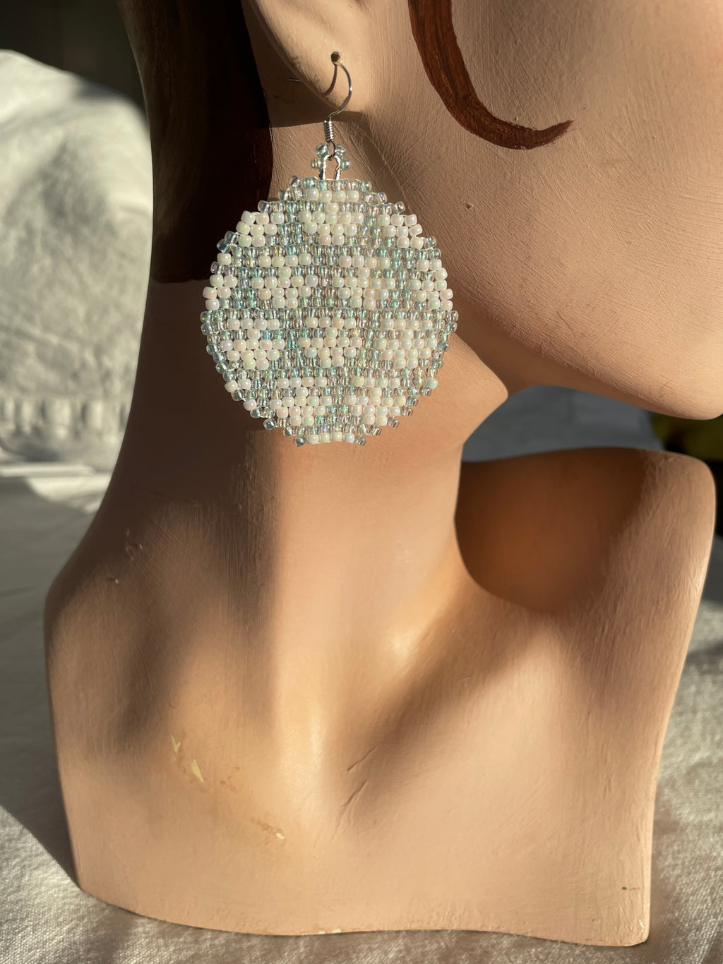 Ulo, the female planet - iceblue and white