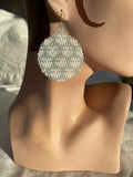 Ulo, the female planet - iceblue and white