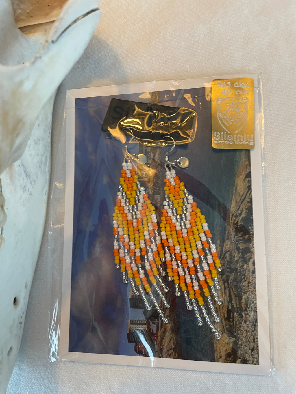 Arctic Feather Fringes, silver and orange.