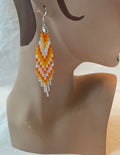 Arctic Feather Fringes, silver and orange.